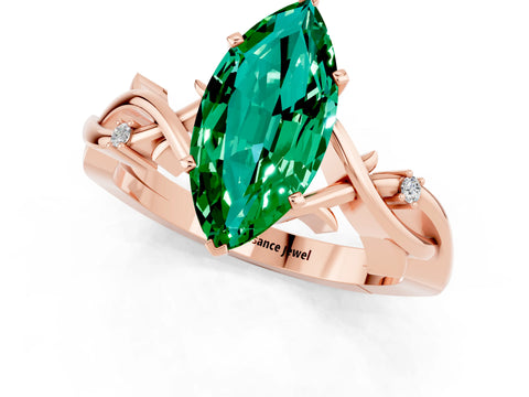 Rose gold Marquise Cut Emerald Solitaire Ring with Twisted Band and Prong Setting_1