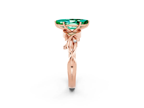 Rose gold Marquise Cut Emerald Solitaire Ring with Twisted Band and Prong Setting