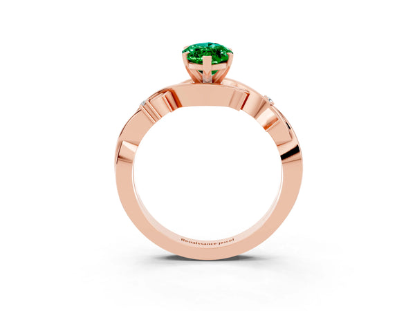 Rose gold Marquise Cut Emerald Solitaire Ring with Twisted Band and Prong Setting