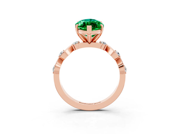 Rose gold Marquise Cut Emerald Solitaire Twisted Band with Round  Accents and Prong Setting