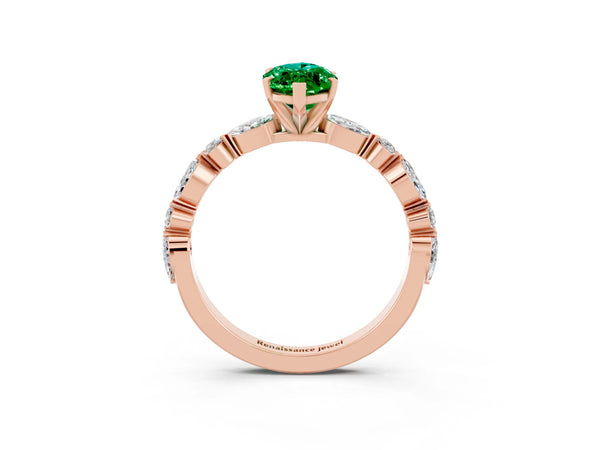 Rose gold Marquise Cut Emerald Ring with Marquise and Round  Side Stones and Four-Prong Setting