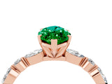 Rose gold Marquise Cut Emerald Solitaire with Side Stones on a Pavé Band and Four-Prong Setting_4