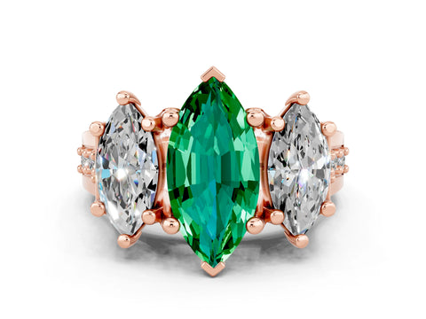 Rose gold Marquise Cut Emerald Three-Stone Ring with Channel Set Band and Four-Prong Setting