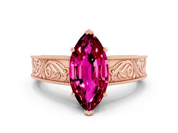 Rose gold Marquise Cut Garnet Solitaire Ring with Engraved Band and Four-Prong Setting
