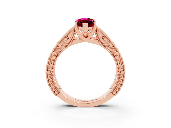 Rose gold Marquise Cut Garnet Solitaire Ring with Engraved Band and Four-Prong Setting