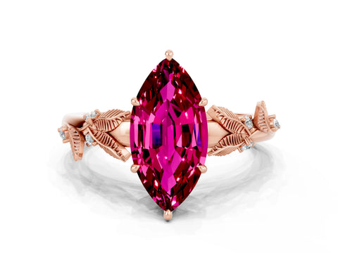Rose gold Marquise Cut Garnet Solitaire Ring with Leaf Motif Band and Four-Prong Setting