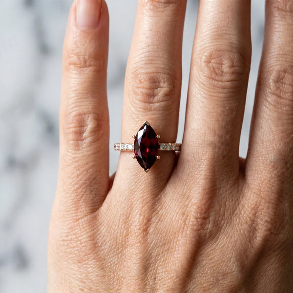 Rose gold Marquise Cut Garnet Solitaire Ring with Round  Pavé Band and Four-Prong Setting