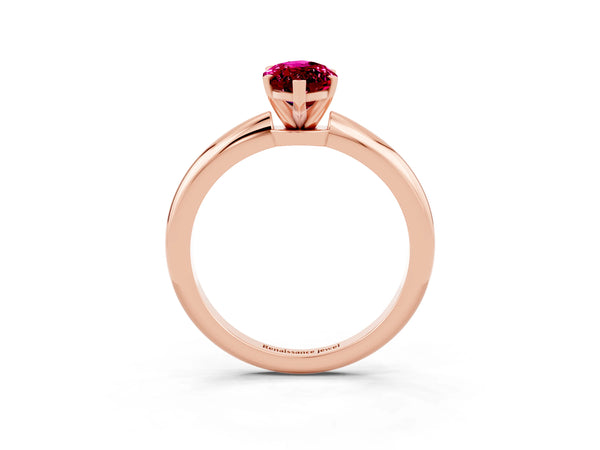 Rose gold Marquise Cut Garnet Solitaire Ring with Six-Prong Setting and Classic Band
