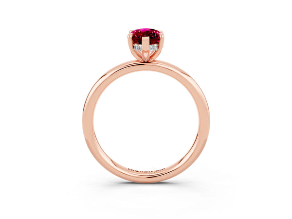 Rose gold Marquise Cut Garnet Solitaire Ring with Thin Band and Four-Prong Setting