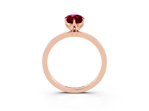 Rose gold Marquise Cut Garnet Solitaire Ring with Thin Band and Prong Setting