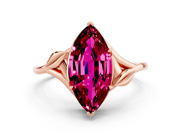 Rose gold Marquise Cut Garnet Solitaire Ring with Twist Band and Four-Prong Setting