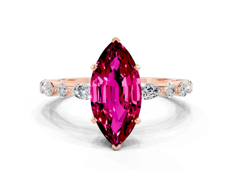 Rose gold Marquise Cut Garnet Solitaire with Side Stones on a Pavé Band and Four-Prong Setting