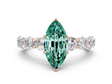Rose gold Marquise Cut Green Sapphire Prong Setting with Side Stones on a Pave Band