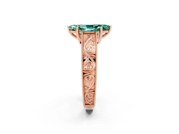Rose gold Marquise Cut Green Sapphire Solitaire Ring with Engraved Band and Four-Prong Setting