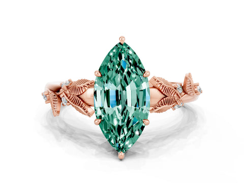 Rose gold Marquise Cut Green Sapphire Solitaire Ring with Leaf Motif Band and Four-Prong Setting
