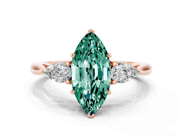 Rose gold Marquise Cut Green Sapphire Three-Stone Ring with Pear  Side Stones and Prong Setting