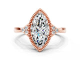 Rose gold Marquise Cut Moissanite Halo Ring with Tapered Band and Four-Prong Setting
