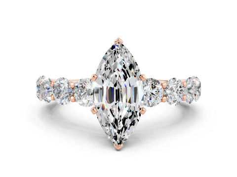 Rose gold Marquise Cut Moissanite Prong Setting with Side Stones on a Pave Band