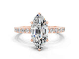 Rose gold Marquise Cut Moissanite Solitaire Engagement Ring with Pavé Band and Four-Prong Setting