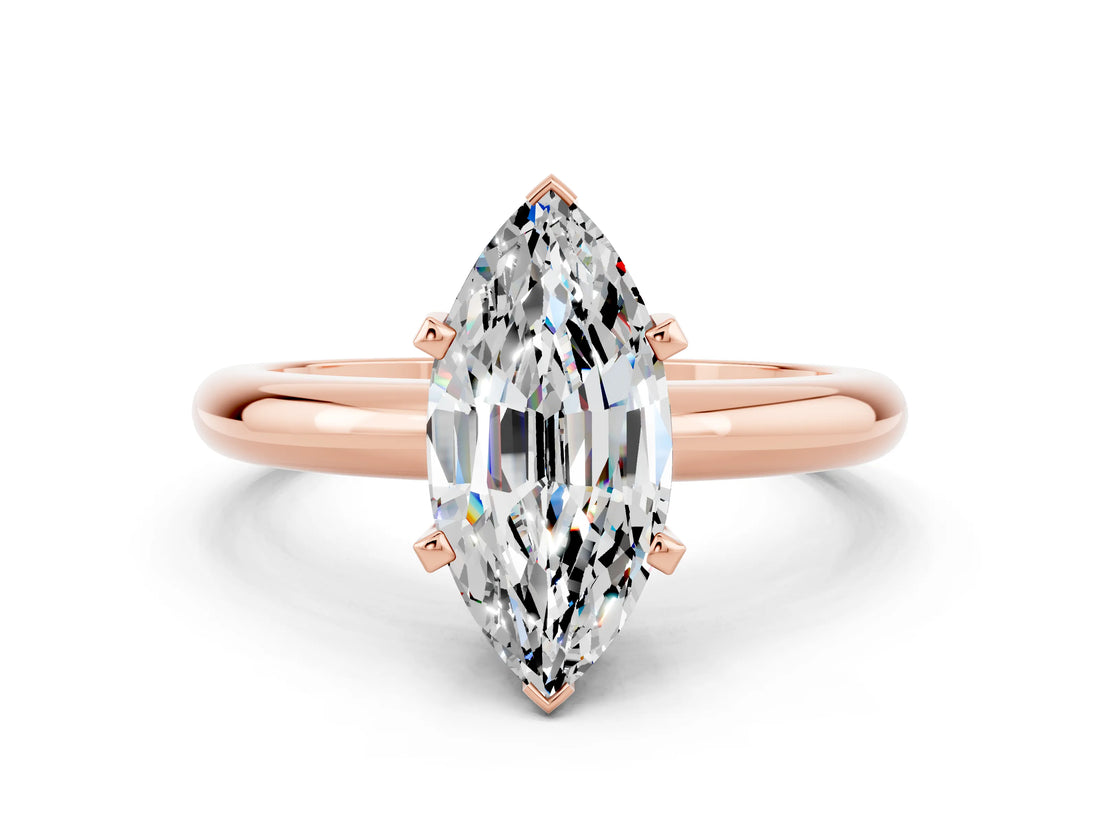 Rose gold Marquise Cut Moissanite Solitaire Engagement Ring with Round Band and Four-Prong Setting