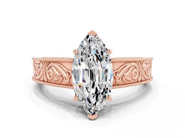 Rose gold Marquise Cut Moissanite Solitaire Ring with Engraved Band and Four-Prong Setting