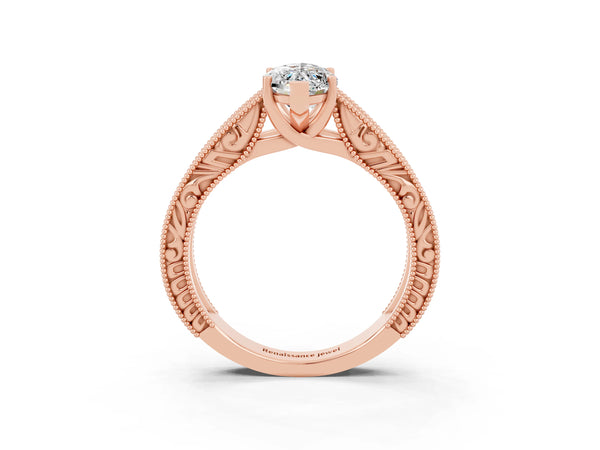 Rose gold Marquise Cut Moissanite Solitaire Ring with Engraved Band and Four-Prong Setting