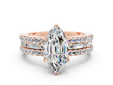 Rose gold Marquise Cut Moissanite Solitaire Ring with Pavé and Channel Set Band