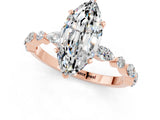 Rose gold Marquise Cut Moissanite Solitaire with Side Stones on a Pavé Band and Four-Prong Setting_1