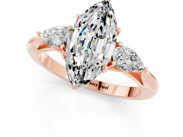 Rose gold Marquise Cut Moissanite Three-Stone Ring with Pear  Side Stones and Prong Setting