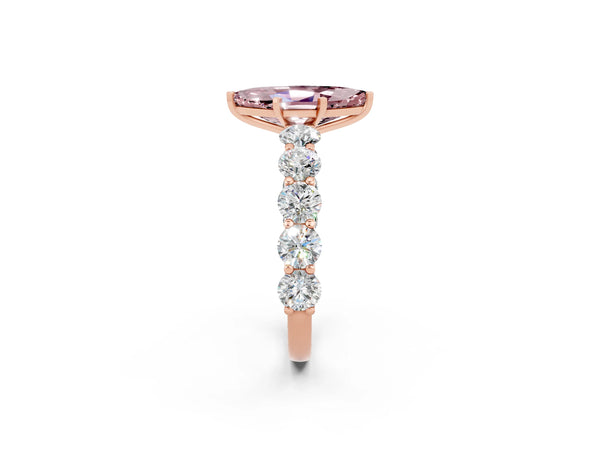 Rose gold Marquise Cut Morganite Prong Setting with Side Stones on a Pave Band
