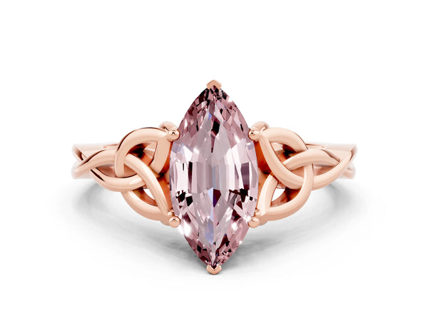 Rose gold Marquise Cut Morganite Solitaire Engagement Ring with Celtic Knot Band and Four-Prong Setting
