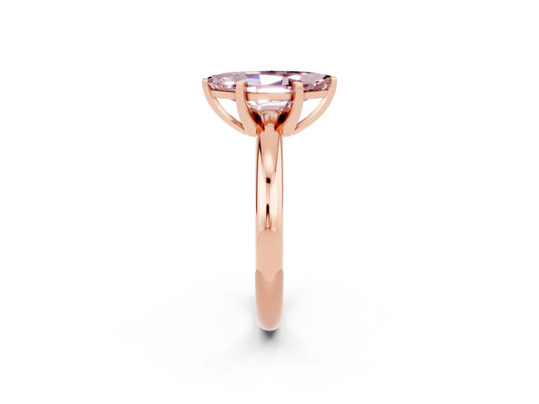 Rose gold Marquise Cut Morganite Solitaire Engagement Ring with Round Band and Four-Prong Setting