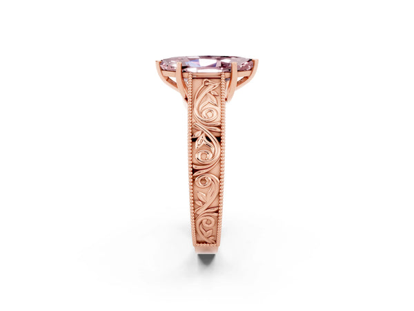 Rose gold Marquise Cut Morganite Solitaire Ring with Engraved Band and Four-Prong Setting