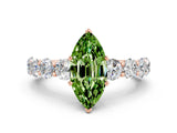Rose gold Marquise Cut Peridot Prong Setting with Side Stones on a Pave Band