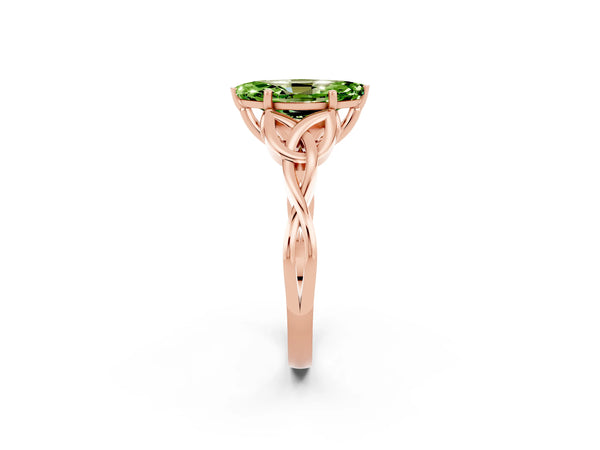Rose gold Marquise Cut Peridot Solitaire Engagement Ring with Celtic Knot Band and Four-Prong Setting