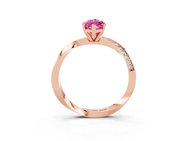 Rose gold Marquise Cut Pink Sapphire Engagement Ring with Side Stone Accents and Four-Prong Setting