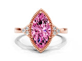 Rose gold Marquise Cut Pink Sapphire Halo Ring with Tapered Band and Four-Prong Setting
