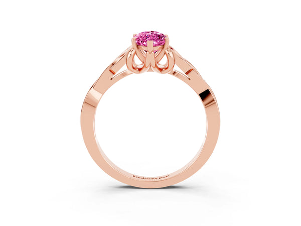 Rose gold Marquise Cut Pink Sapphire Solitaire Engagement Ring with Celtic Knot Band and Four-Prong Setting