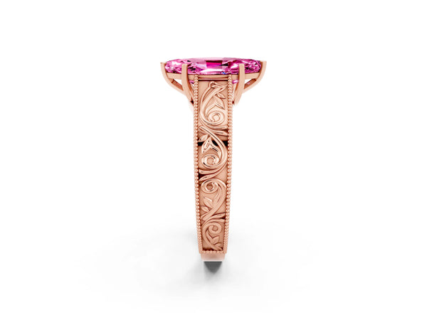 Rose gold Marquise Cut Pink Sapphire Solitaire Ring with Engraved Band and Four-Prong Setting