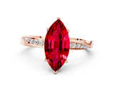 Rose gold Marquise Cut Ruby Engagement Ring with Side Stone Accents and Four-Prong Setting_60