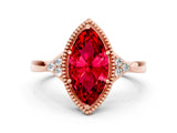 Rose gold Marquise Cut Ruby Halo Ring with Tapered Band and Four-Prong Setting