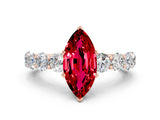 Rose gold Marquise Cut Ruby Prong Setting with Side Stones on a Pave Band