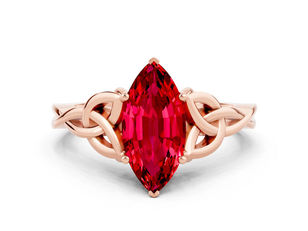 Rose gold Marquise Cut Ruby Solitaire Engagement Ring with Celtic Knot Band and Four-Prong Setting