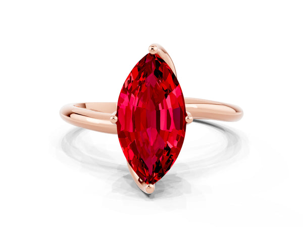 Rose gold Marquise Cut Ruby Solitaire Engagement Ring with Four-Prong Setting and Classic Band