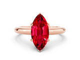 Rose gold Marquise Cut Ruby Solitaire Engagement Ring with Round Band and Four-Prong Setting