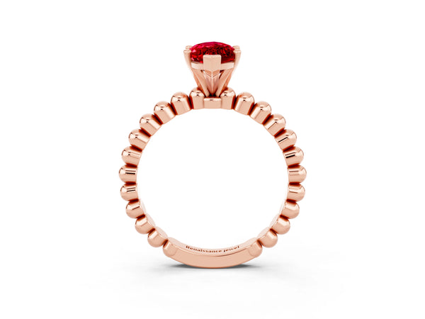 Rose gold Marquise Cut Ruby Solitaire Ring with Beaded Band and Prong Setting