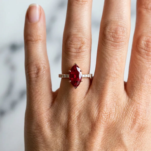 Rose gold Marquise Cut Ruby Solitaire Ring with Round  Pavé Band and Four-Prong Setting