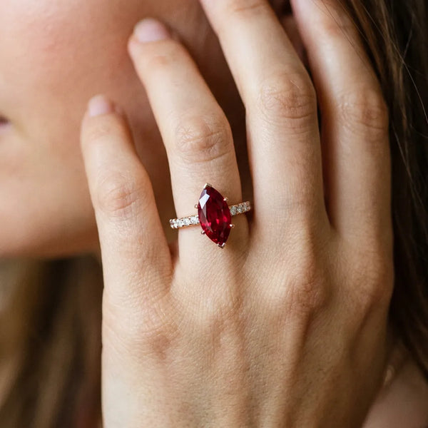 Rose gold Marquise Cut Ruby Solitaire Ring with Round  Pavé Band and Four-Prong Setting