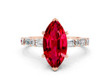 Rose gold Marquise Cut Ruby Solitaire with Side Baguettes and Channel Set Band