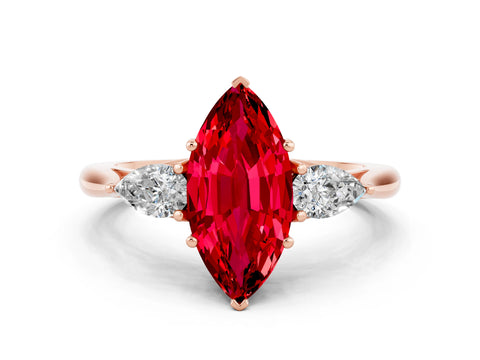 Rose gold Marquise Cut Ruby Three-Stone Ring with Pear Side Stones and Four-Prong Setting_12